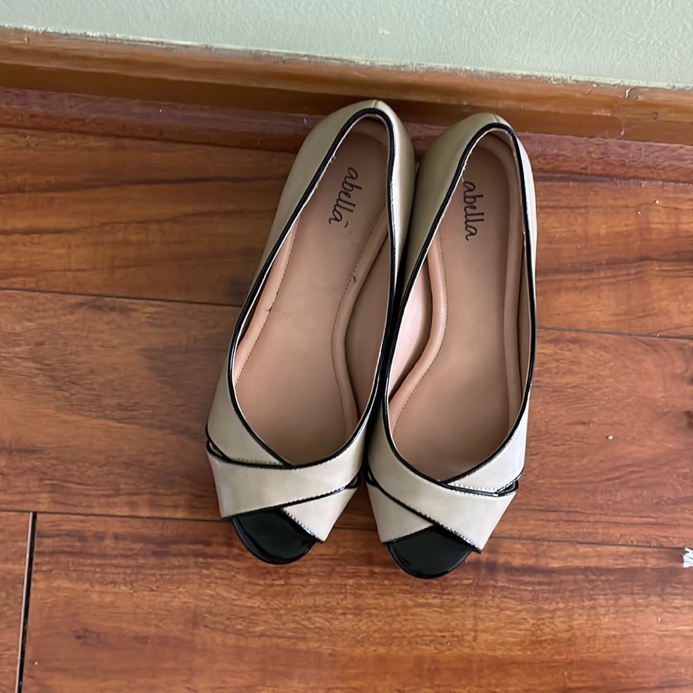 Size 8.5 beige and black wedge heels.